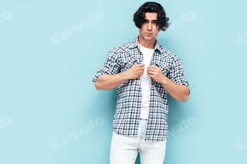 Preview: Handsome stylish man posing in studio