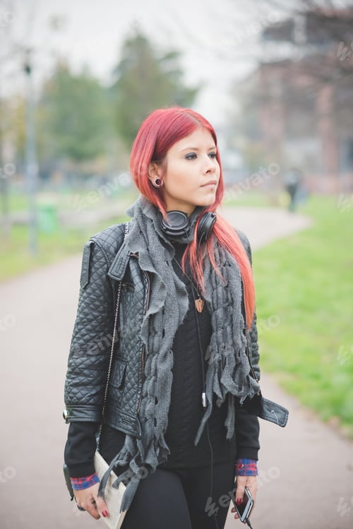 Preview: young beautiful red hair venezuelan woman lifestyle listening music