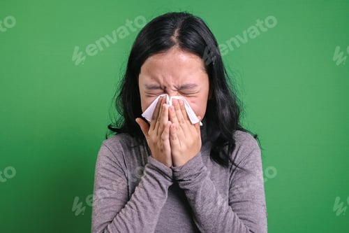 Preview: Girl Blowing Nose