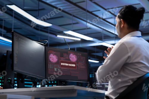 Preview: Data center cybersecurity specialist fighting virus during security breach