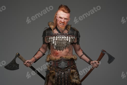 Preview: Raging viking barbarian with two axes isolated on gray