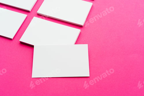 Preview: Mock-up on pink background. Businesscards with copy space