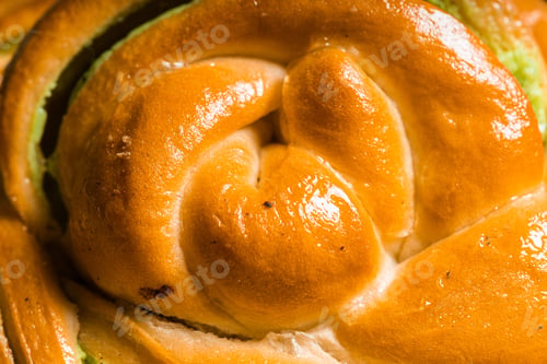 Preview: homemade buns with cream and pistachio cream decorated with thyme freshly baked for breakfast