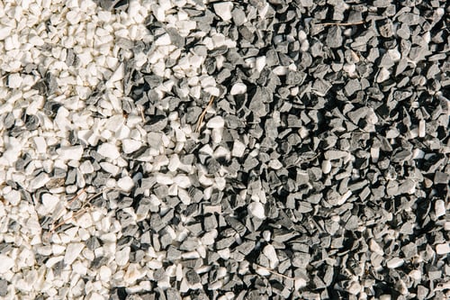 Preview: top view of black and white pebble stones for background