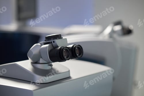 Preview: Close up of Surgical Microscope Awaiting Use in Hospital Operating Room