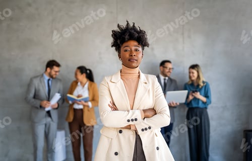 Preview: Professional in office environment, highlighting teamwork, collaboration, leadership, and innovation