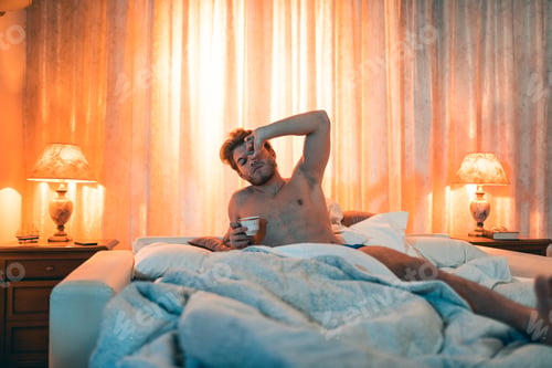 Preview: Boy wakes up in bed and yawns
