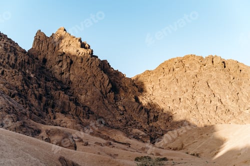 Preview: Photo of a sandy desert at sunset. Sunset in the desert