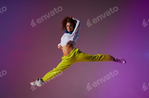 Preview: Young dancer doing split leap