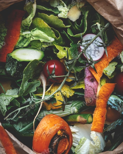 Preview: Sorted kitchen food waste in paper eco friendly bag for compost. Sustainable lifestyle