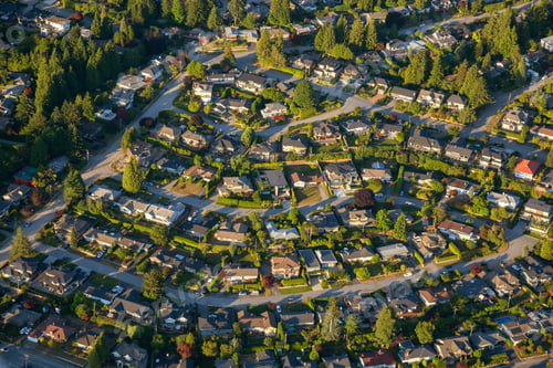 Preview: Aerial view of the residential homes during a vibrant sunny summer day