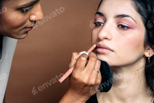 Preview: Woman Getting her Makeup Done