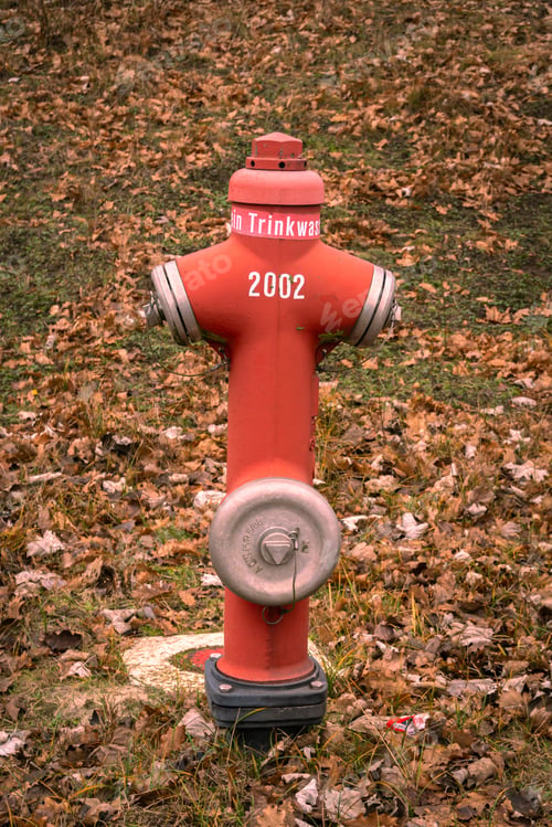 Preview: Vertical shot of a red fire hydrant