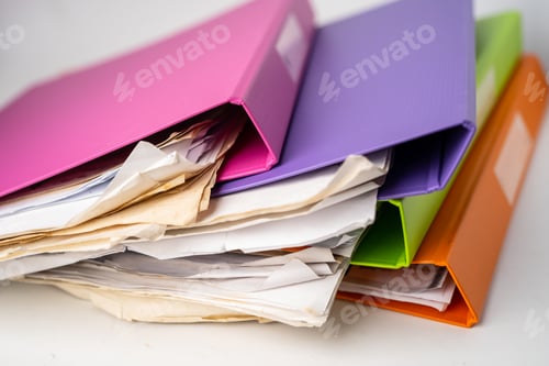 Preview: File Folder Binder stack of multi color on table in office.