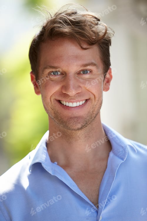 Preview: Outdoor Head And Shoulders Portrait Of Smiling Man