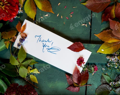 Preview: Autumn theme thank you card hand written note on rustic wood with autumn blooming fall flowers and