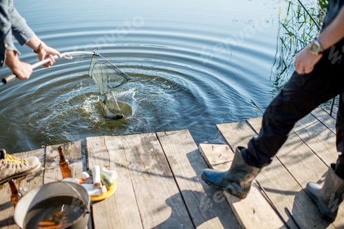 Preview: Fisherman catching fish