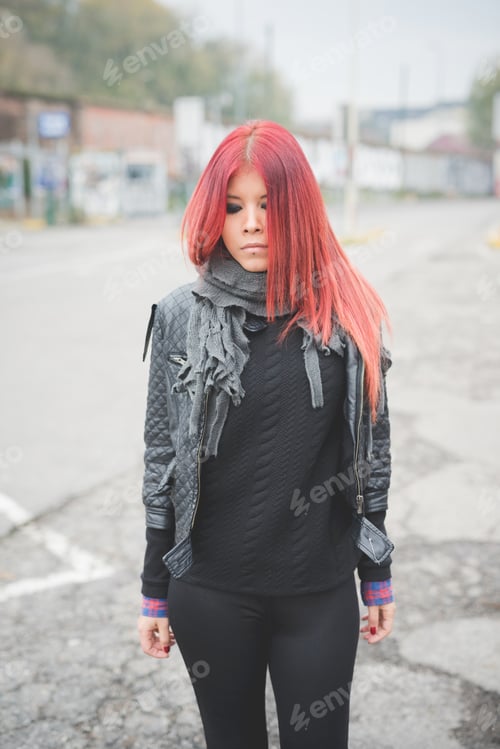 Preview: Serious Young Adult with Red Hair Outdoors