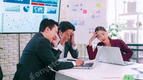 Preview: A group of marketers are having a serious discussion at the meeting.