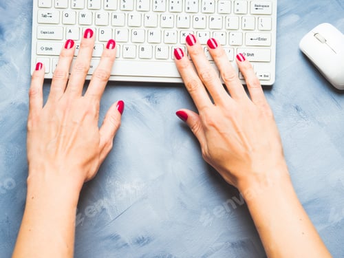 Preview: Blue background with woman's hand and keyboard