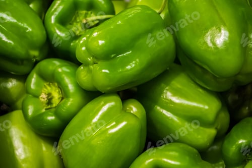 Preview: Green bell pepper at a farmers market. Vegetables for a diet.