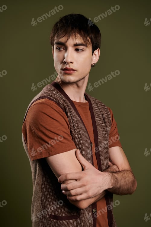 Preview: Elegant Man Posing Against Vibrant Green Backdrop