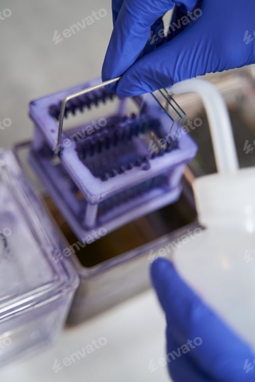 Preview: Close-up photo of medical worker preparing equipment for use