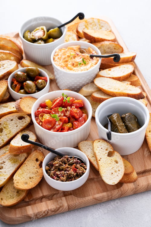 Preview: Snack board with toasted baguette and variety of dips