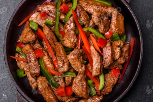 Preview: Delicious Asian teriyaki meat with red and green bell peppers