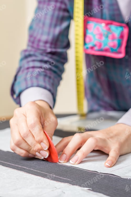 Preview: Dressmaker design tailor pattern on the table