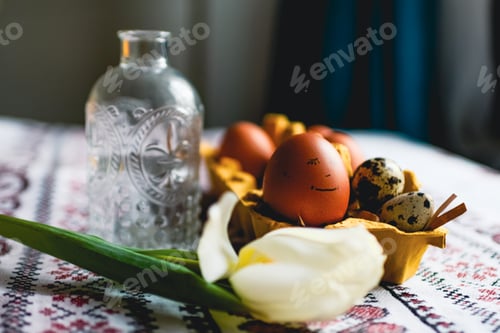 Preview: Decorated Easter Eggs with Bottle and White Flower