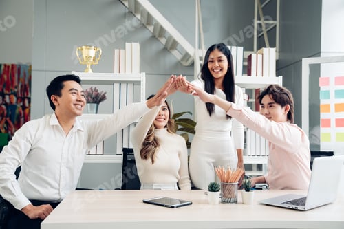 Preview: Group of colleagues celebrating success, business meeting.