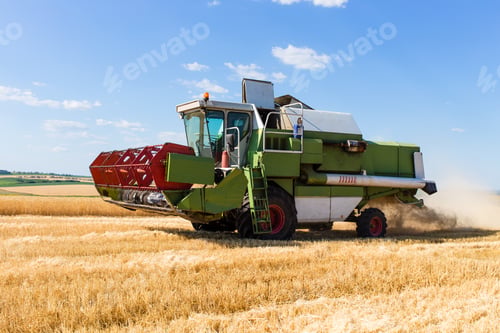 Preview: Combine harvester working on a wheat field.