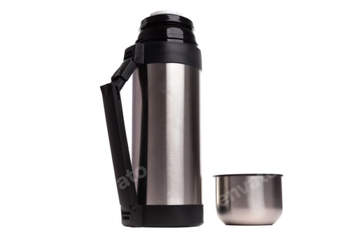 Preview: a large metal thermos with a plastic handle folding and a free-standing cup on a white background