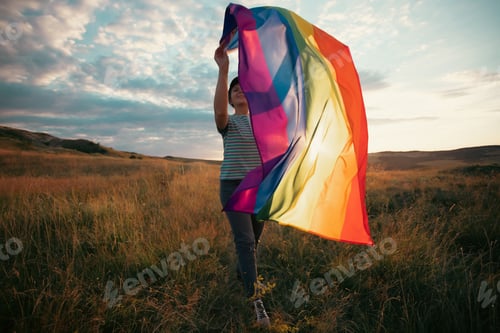 Preview: Young woman with LGBT flag.
