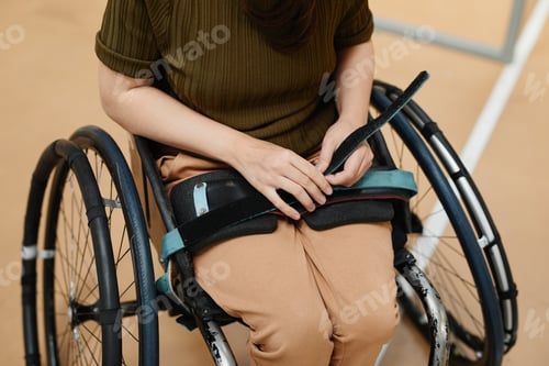 Preview: Woman Strapping to Wheelchair