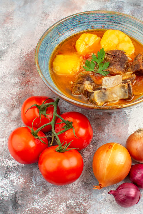 Preview: front view homemade bozbash soup tomatoes onions on nude background