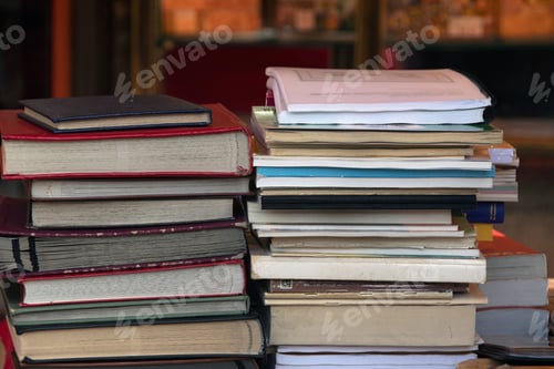 Preview: Closeup shot of a pile of books - concept of education