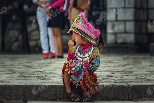 Preview: cute girl of the flower H'mong indigenous women at walking street in Sapa, Vietnam
