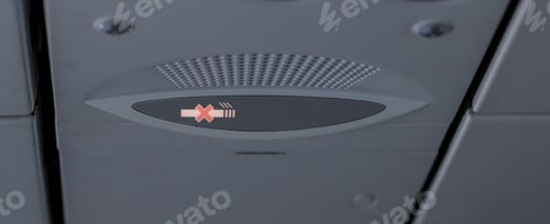 Preview: No Smoking Sign on Airplane Ceiling