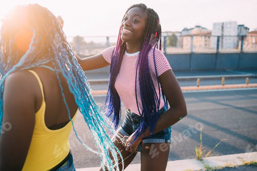 Preview: two women sisters outdoor listening music dancing