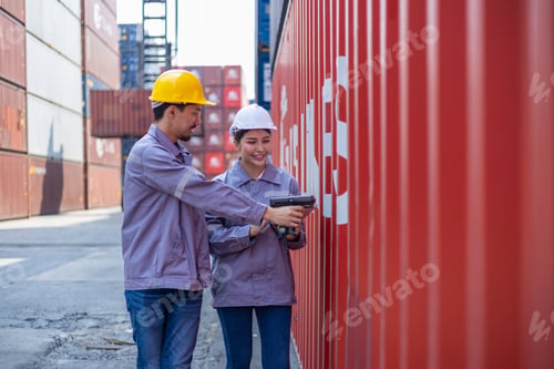 Preview: Portrait of an engineer inspecting products using a barcode scanner. Container import and logistic