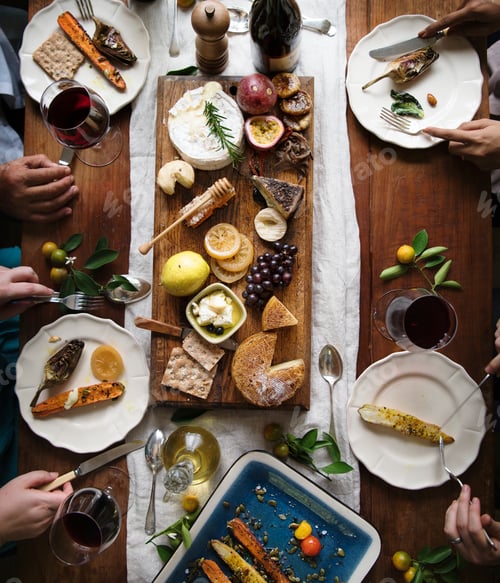 Preview: Adults eating a cheese platter food photography recipe idea