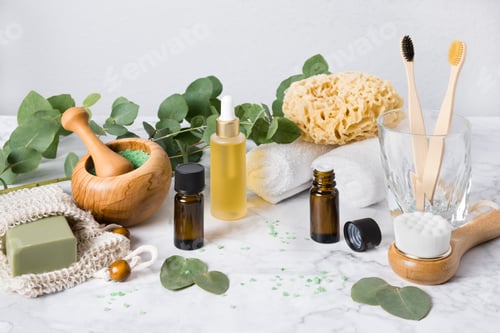 Preview: Eco-friendly bathroom accessories: bamboo toothbrush, wooden brush, sea sponge, natural soap