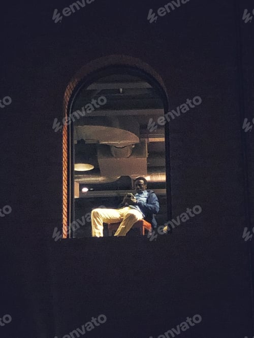 Preview: Man use phone Window