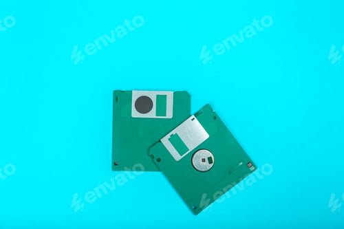 Preview: Vintage floppy disks on a blue background highlighting old technology
