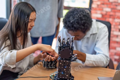 Preview: Teenager children learning with new innovation robotic hand interface hand control in classroom