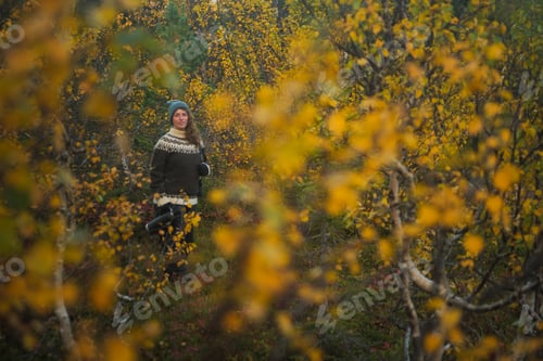 Preview: Standing woman portrait in colourful autumn nature