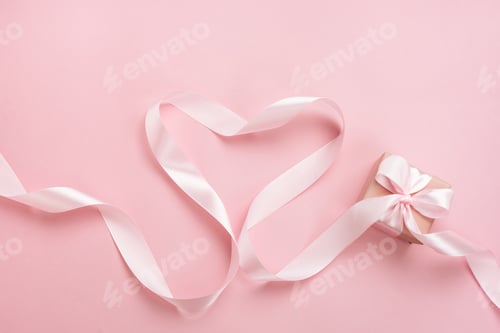 Preview: Pink Gift and Ribbon Heart on Pink Background