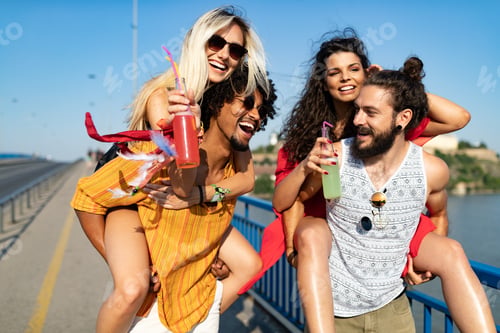 Preview: Group of friends having fun time at music festival